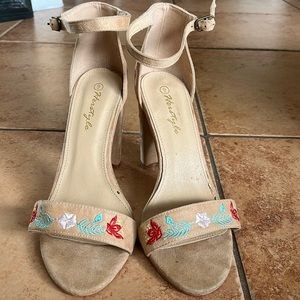 Tan colored heels, colored flowers, and size 9